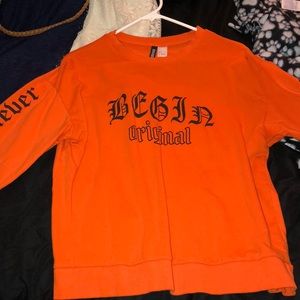 Orange long sleeve shirt